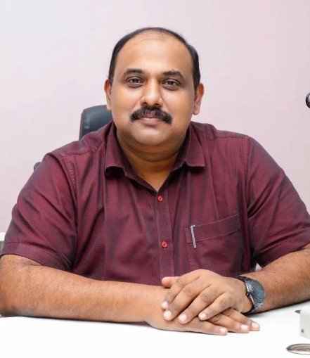 Dr. Thomas  K Chacko